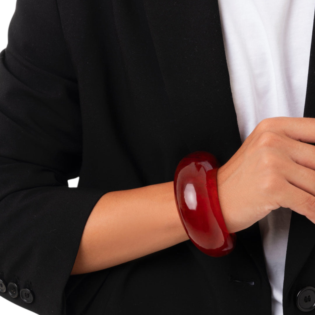 Bracciale semi luna rigido in resina colore ambra