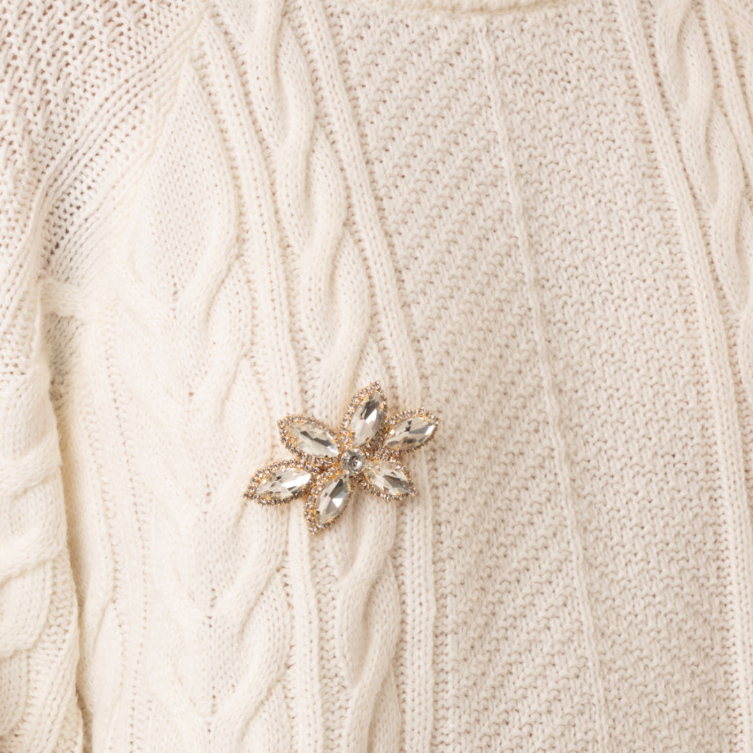 Spilla in metallo a forma di fiore con pietre in vetro crystal