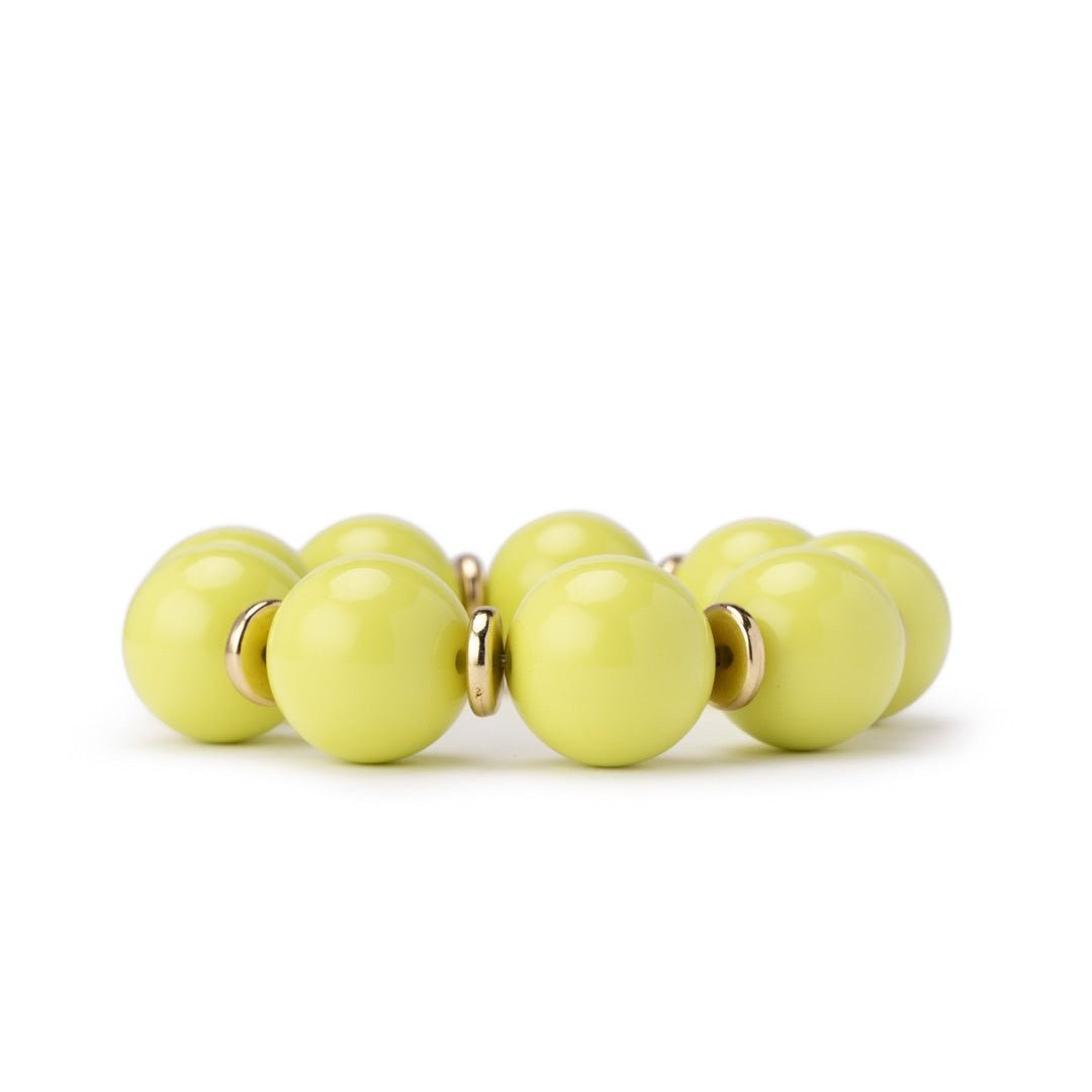 Bracciale elastico con sfere in acrilico verde lime, con rondelle in metallo - Mya Accessories