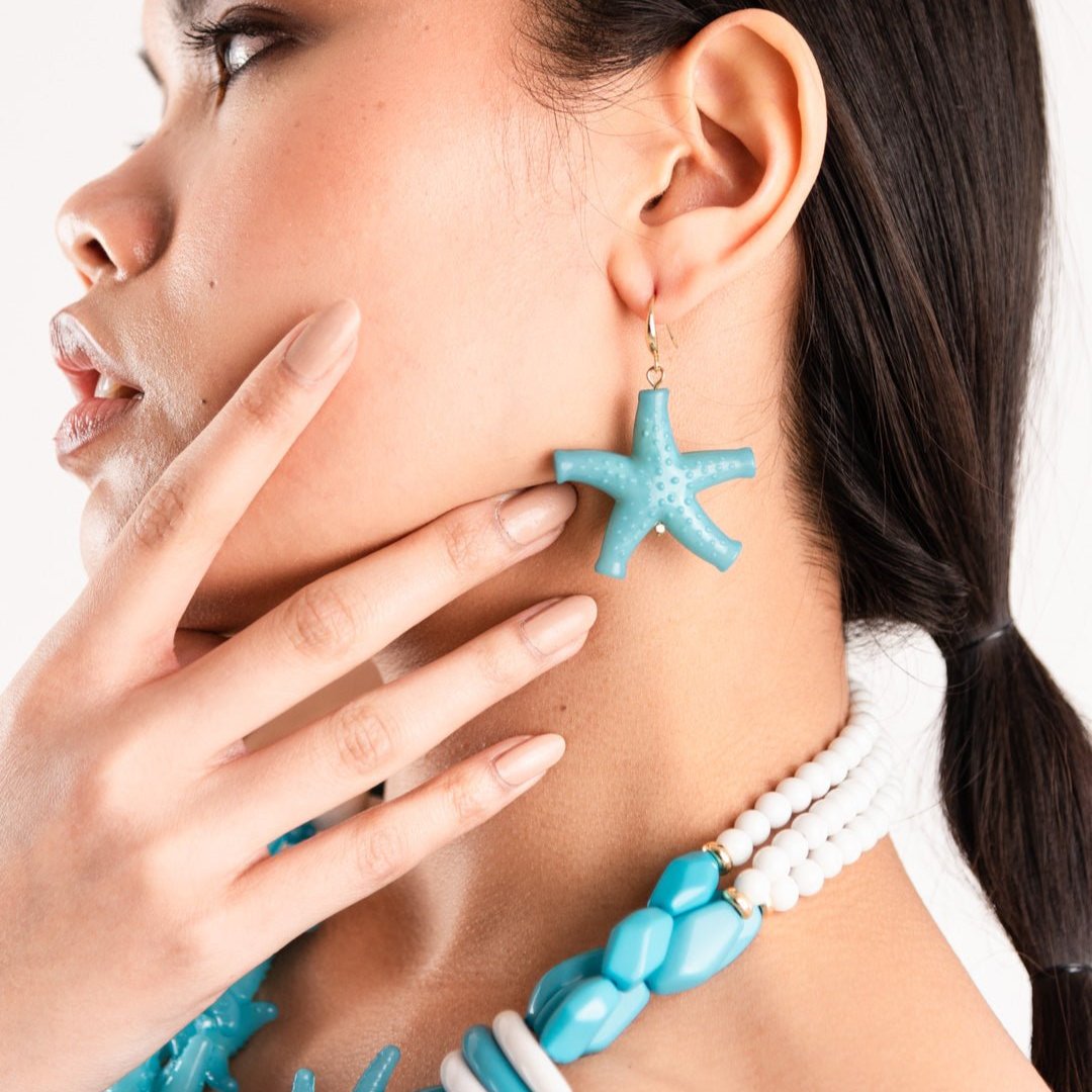 Orecchini pendente a stella marina in acrilico turchese - Mya Accessories