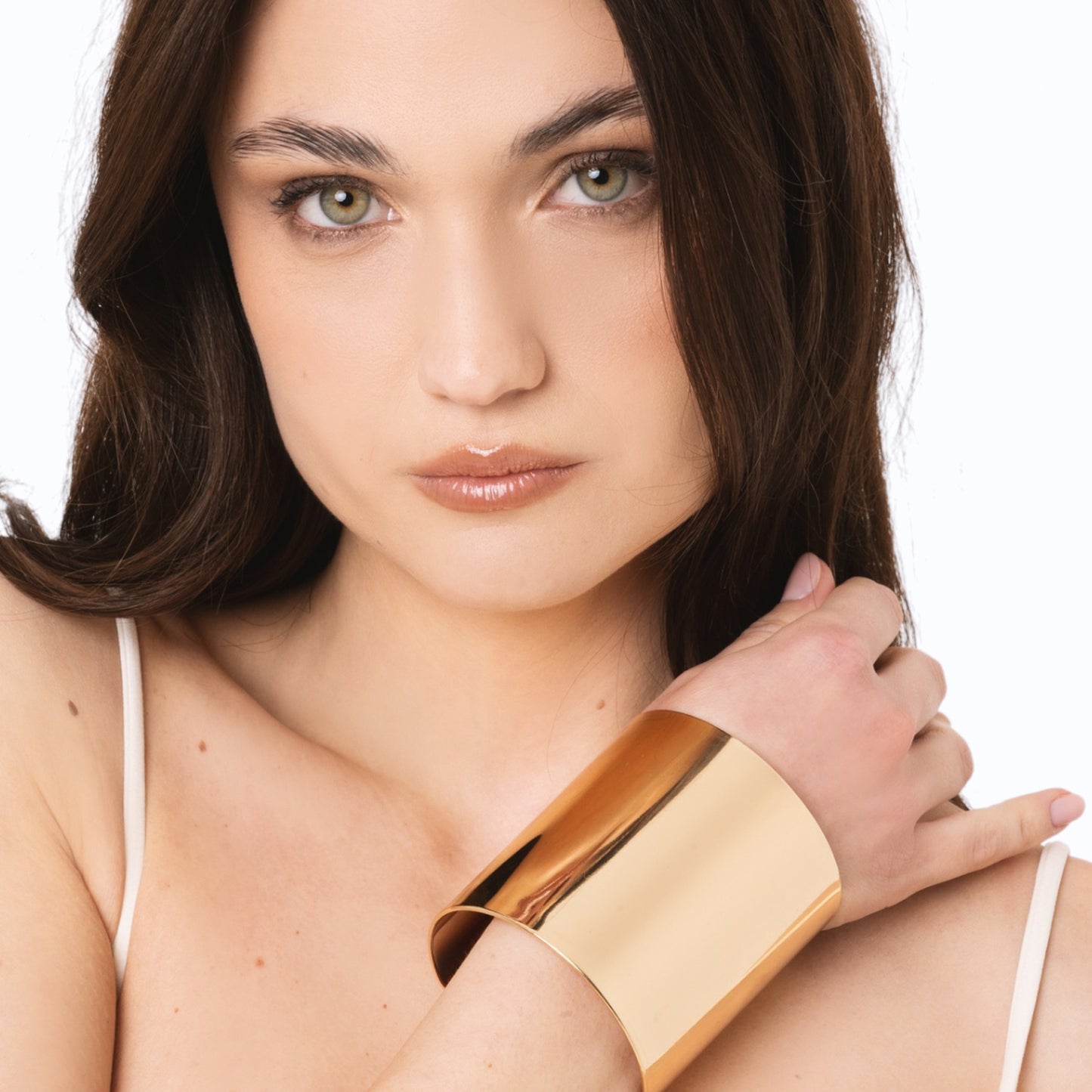 Bracciale rigido in metallo lucido