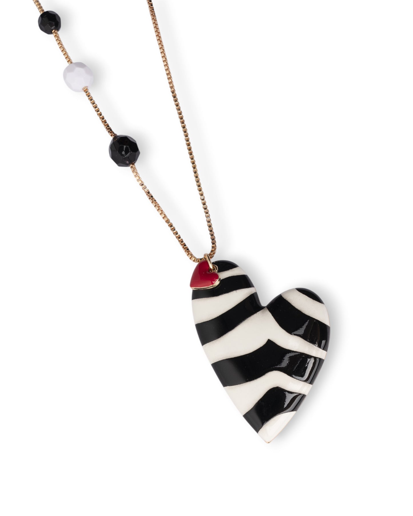 Collana lunga con pietre dure e pendente a cuore smaltato zebrato bianco e nero