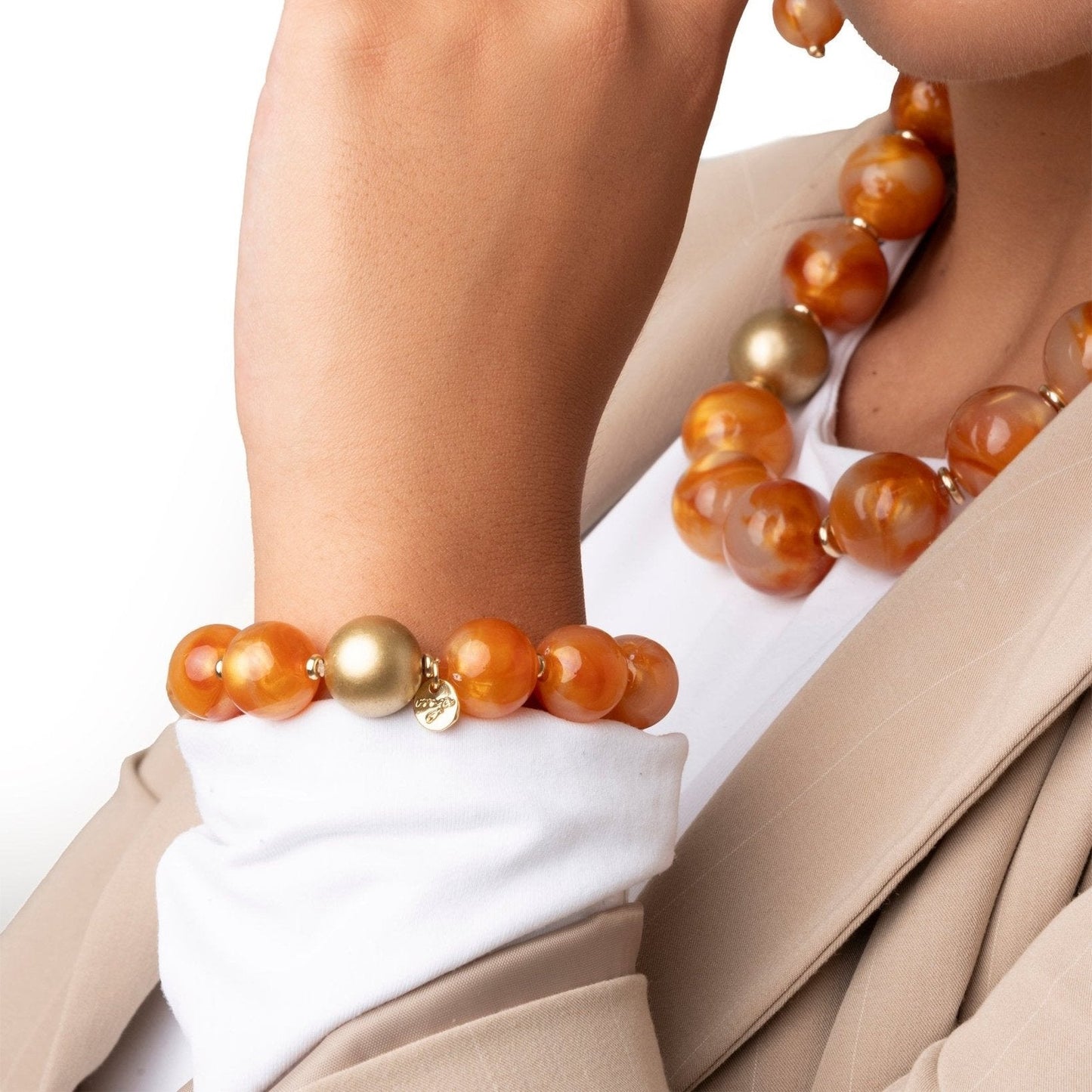 Bracciale elastico con sfere dalle nuances arancio - Mya Accessories