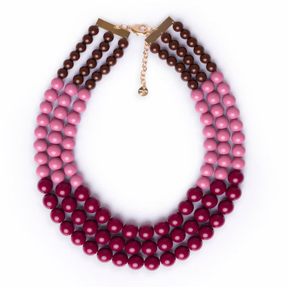 Collana girocollo multilinee con sfere in acrilico tono viola
