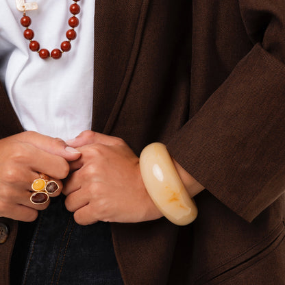 Bracciale semi luna rigido in resina beige