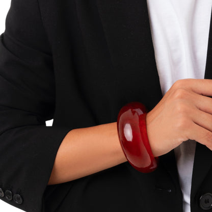 Bracciale semi luna rigido in resina colore ambra