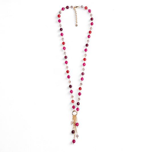 Collana lunga con pietre semidure e vetro tono fucsia con pendente