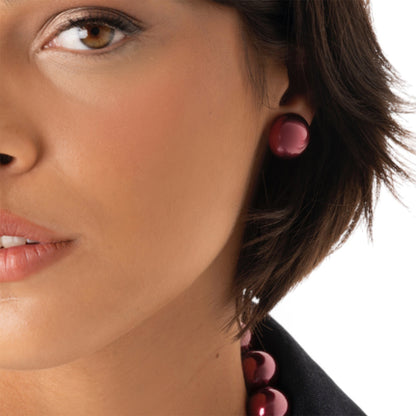 Orecchini a semisfera tono rosa lucido