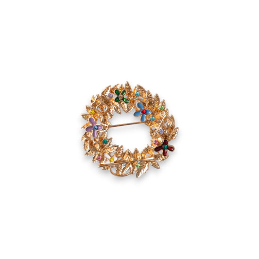 Spilla in metallo a forma di ghirlanda di natale con piccole pietre in vetro multicolore