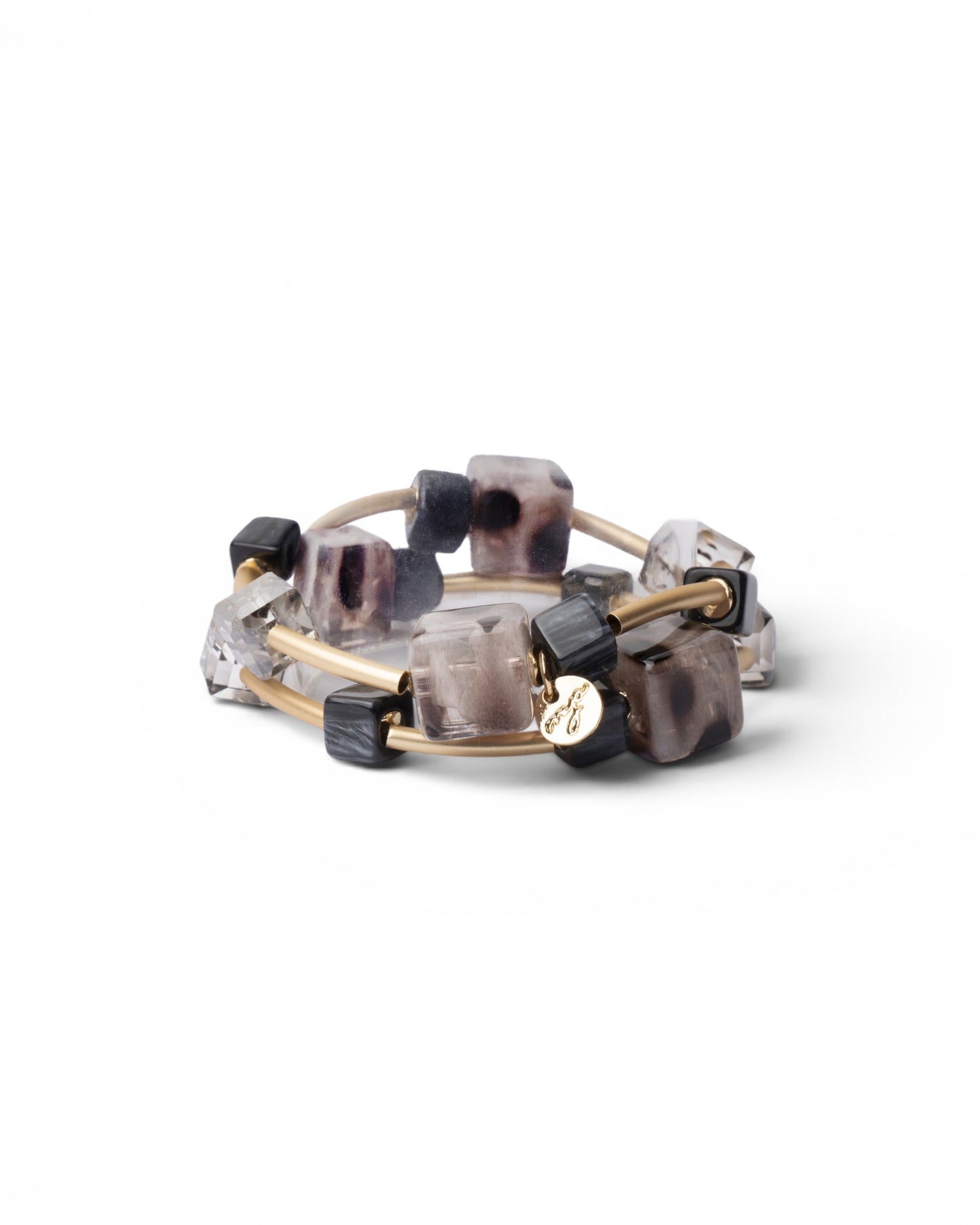 Bracciale elastico in metallo con pietre a cubo in resina animalier tono grigio