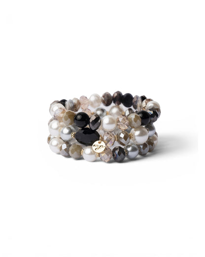 Bracciale elastico a tre fili con pietre in vetro tono grigio