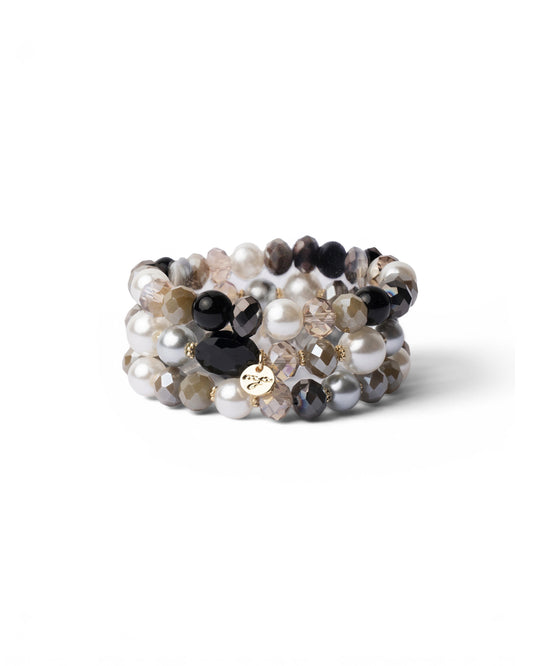 Bracciale elastico a tre fili con pietre in vetro tono grigio