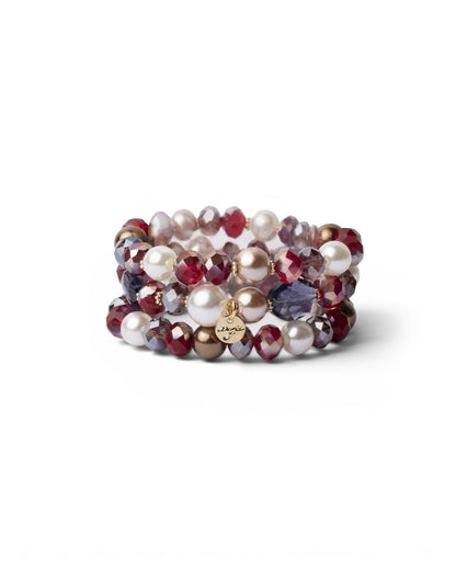 Bracciale elastico a tre fili con pietre in vetro tono rosso