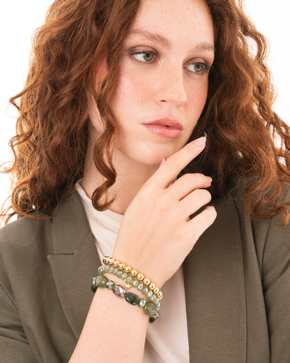Bracciale elastico multi filo con pietre in acrilico e vetro tono verde
