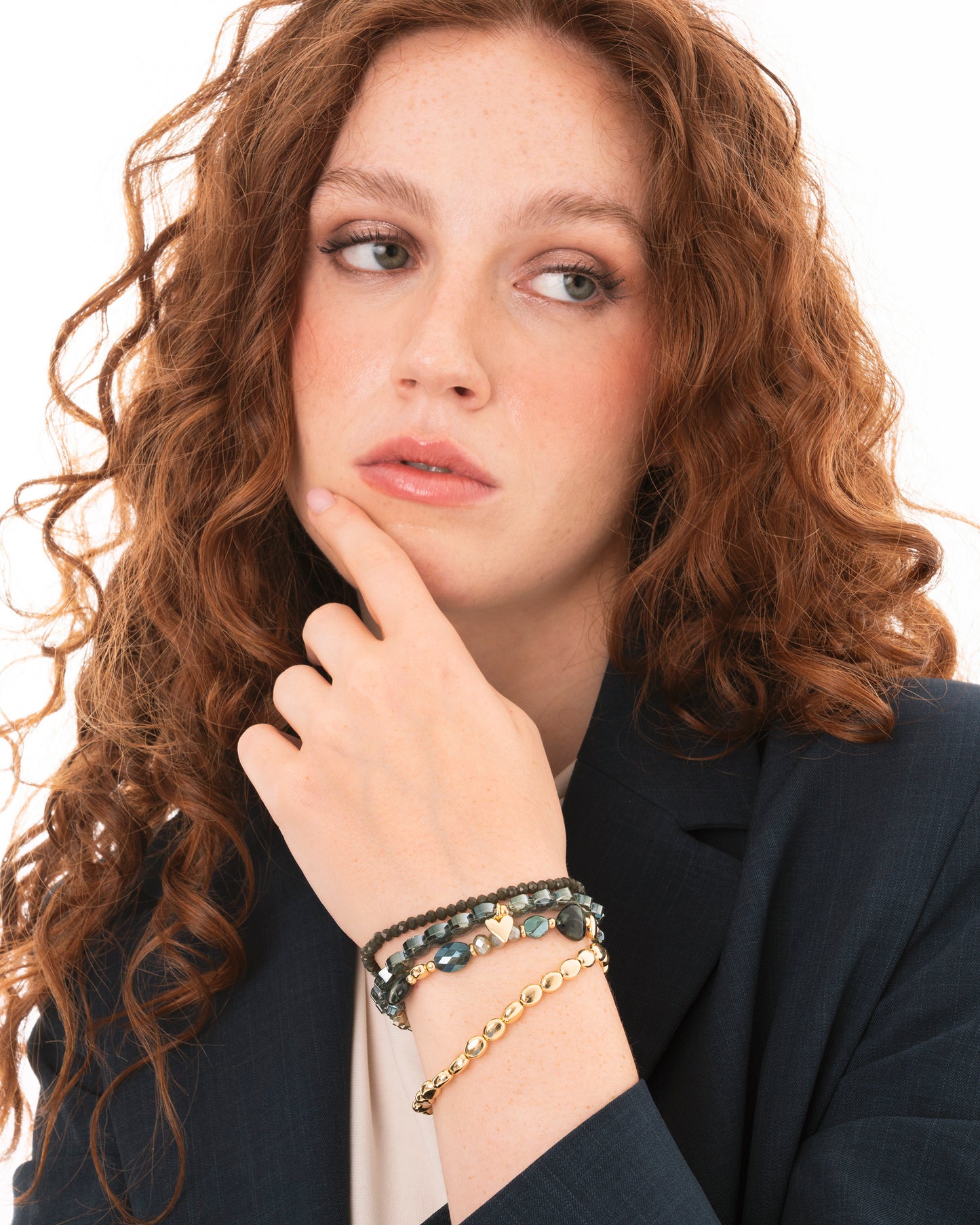 Bracciale elastico multi filo con pietre in vetro tono verde