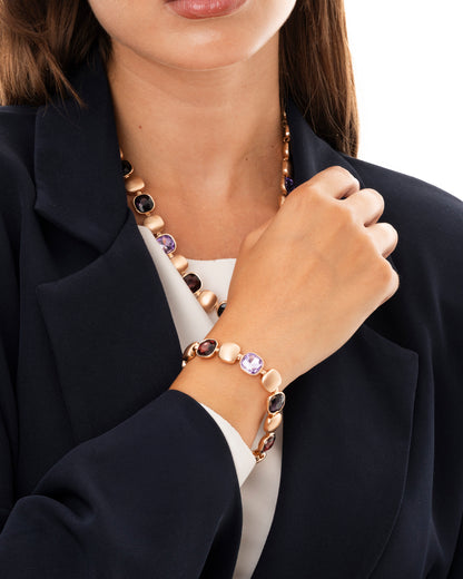Bracciale in metallo con inserti di pietre in vetro viola