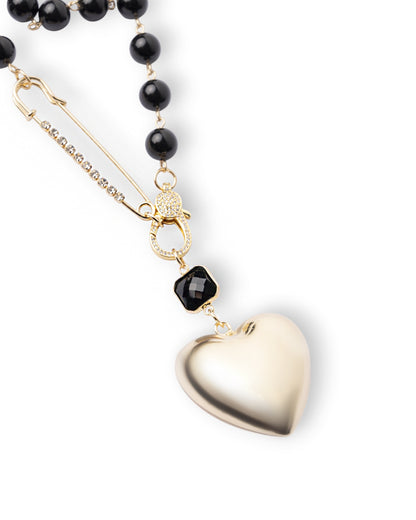 Collana doppio filo di perle in vetro nere con pendente in metallo a cuore