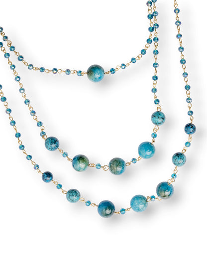 Collana lunga a tre fili con micro pietre e sfere in vetro petrolio