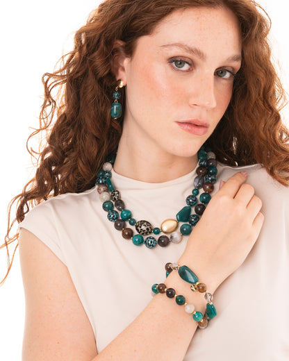 Collana girocollo a due fili con pietre in vetro ed acrilico animalier tono petrolio