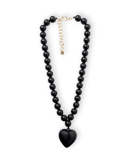 Collana girocollo con sfere in acrilico e pendente a cuore nero