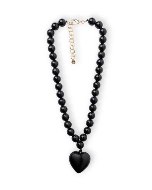 Collana girocollo con sfere in acrilico e pendente a cuore nero