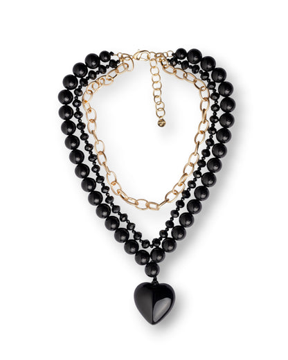 Collana a tre fili con pietre in acrilico e vetro e catena in metallo, pendente a cuore nero
