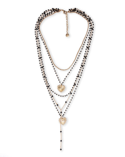 Collana multi fili con pietre in vetro nere e pendenti a cuore