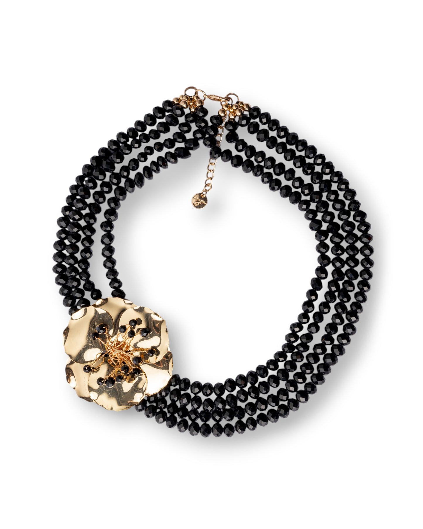Collana multi filo con pietre in vetro nere e fiore in metallo