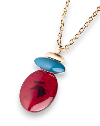 Collana lunga a catena con pendente in acrilico tono bordeaux e azzurro