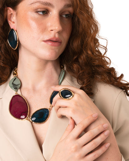 Anello elastico in metallo lucido con pietra in acrilico tono blu