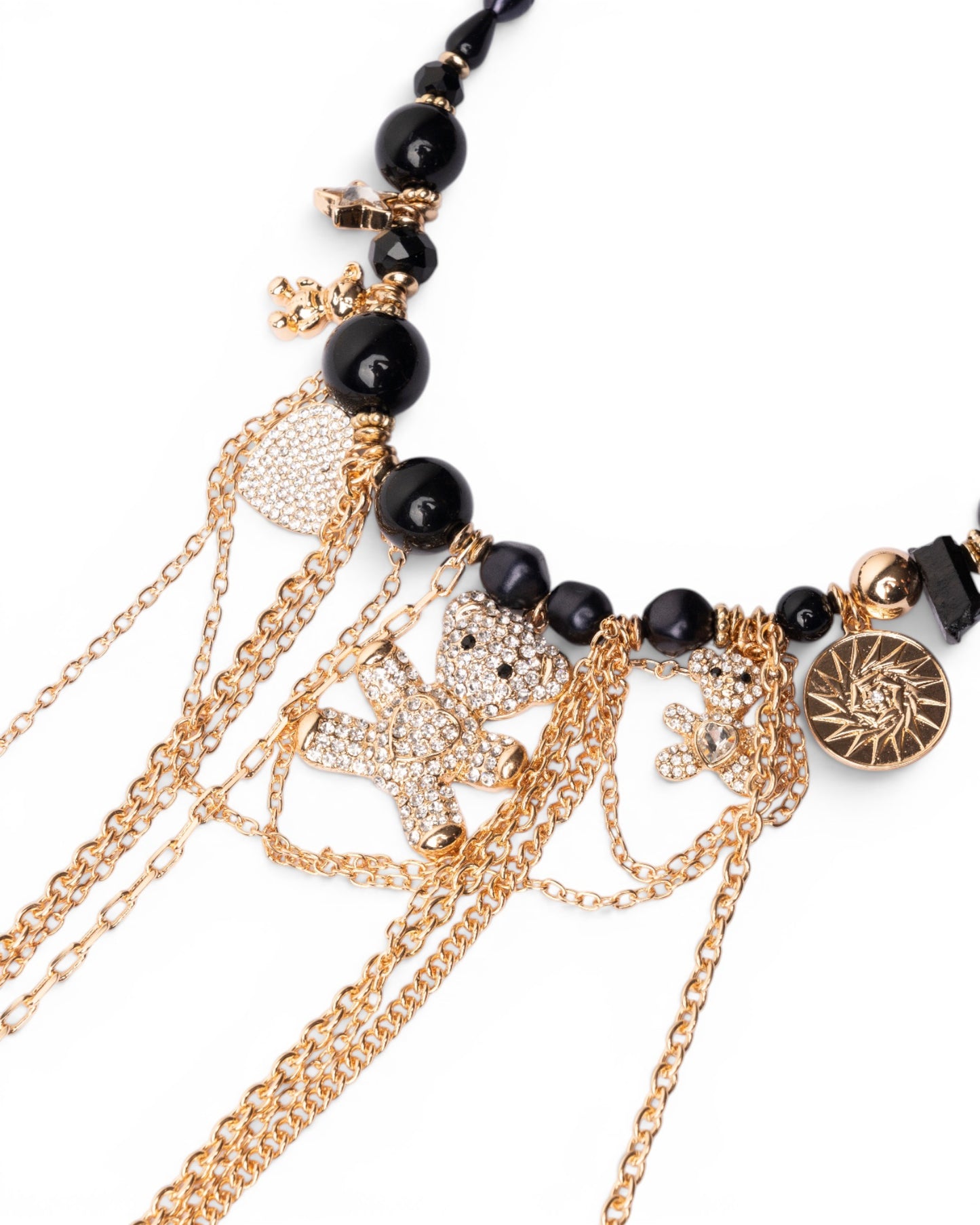 Collana girocollo con pietre nere in acrilico e charms pendenti