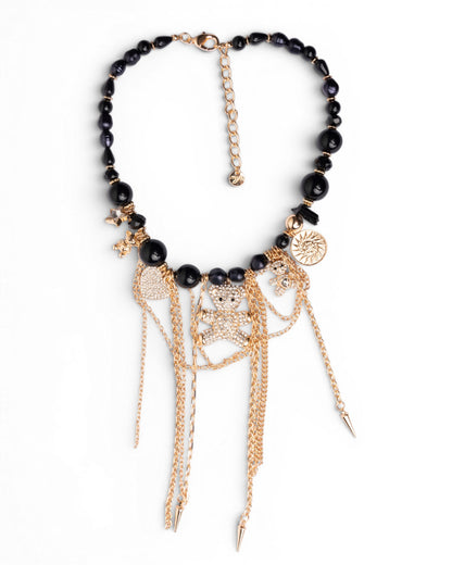 Collana girocollo con pietre nere in acrilico e charms pendenti
