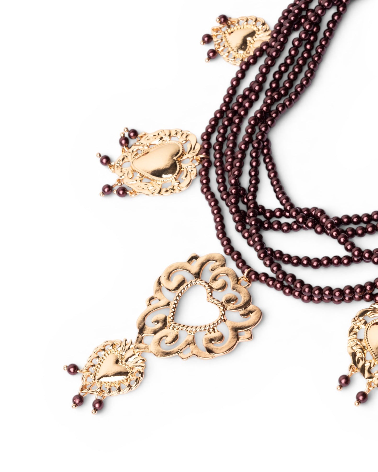 Collana multi fili con micro pietre in acrilico marrone e cuori sacri pendenti