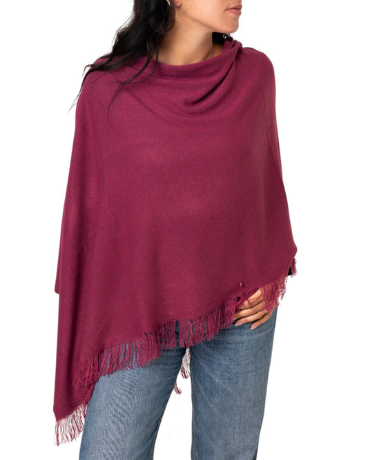 Poncho color melanzana con frange