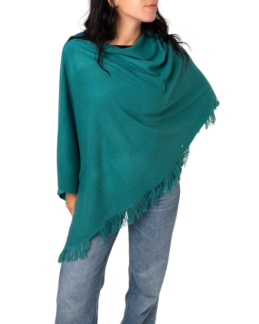 Poncho verde petrolio con frange