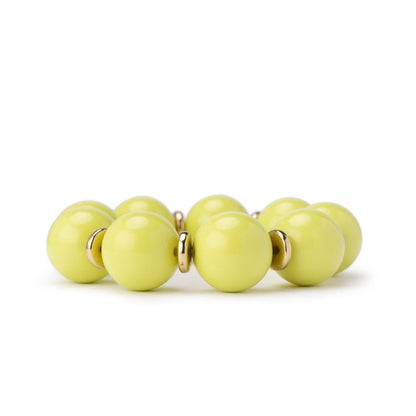 Bracciale elastico con sfere in acrilico verde lime, con rondelle in metallo - Mya Accessories