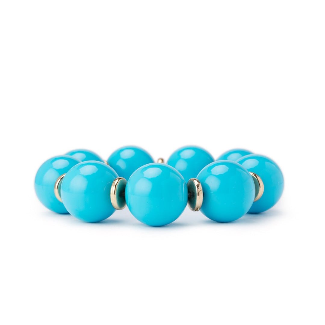 Bracciale elastico con sfere in acrilico azzurro, con rondelle in metallo - Mya Accessories