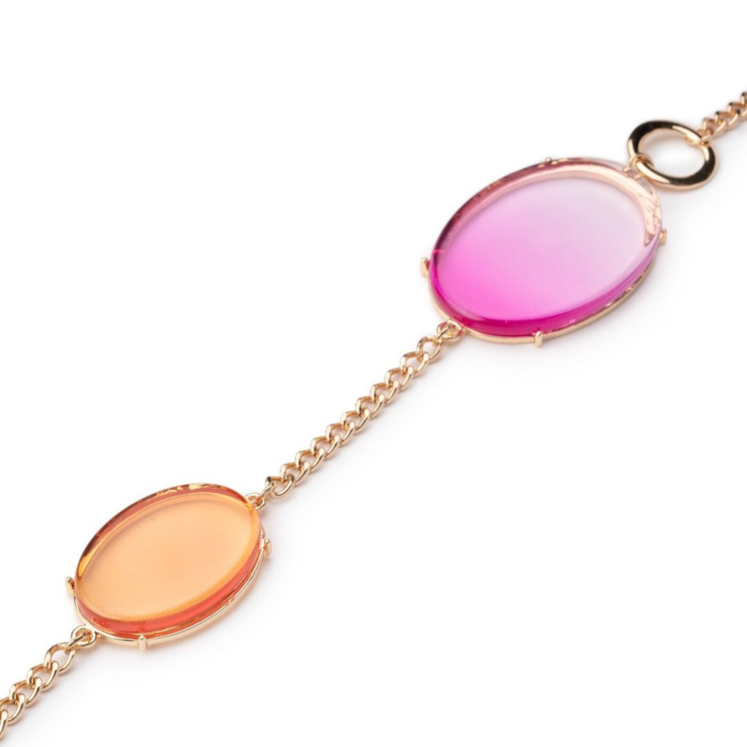 Collana lunga in metallo con inserti circolari in acrilico trasparente fucsia ed arancio - Mya Accessories
