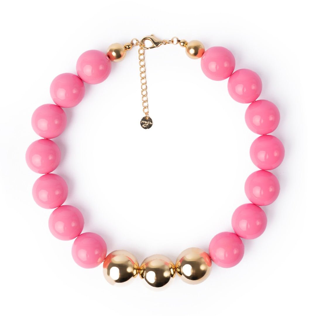 Collana girocollo in acrilico con sfere rosa di cui tre placcate in oro - Mya Accessories