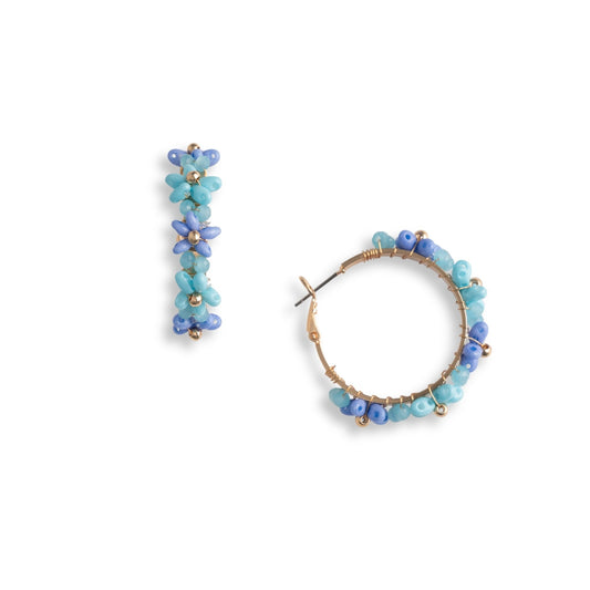 Orecchini pendenti a cerchio con fiori di micro cristali tono azzurro - Mya Accessories