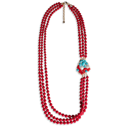 Collana multi filo con sfere in acrilico tono corallo con inserto in vetro multi