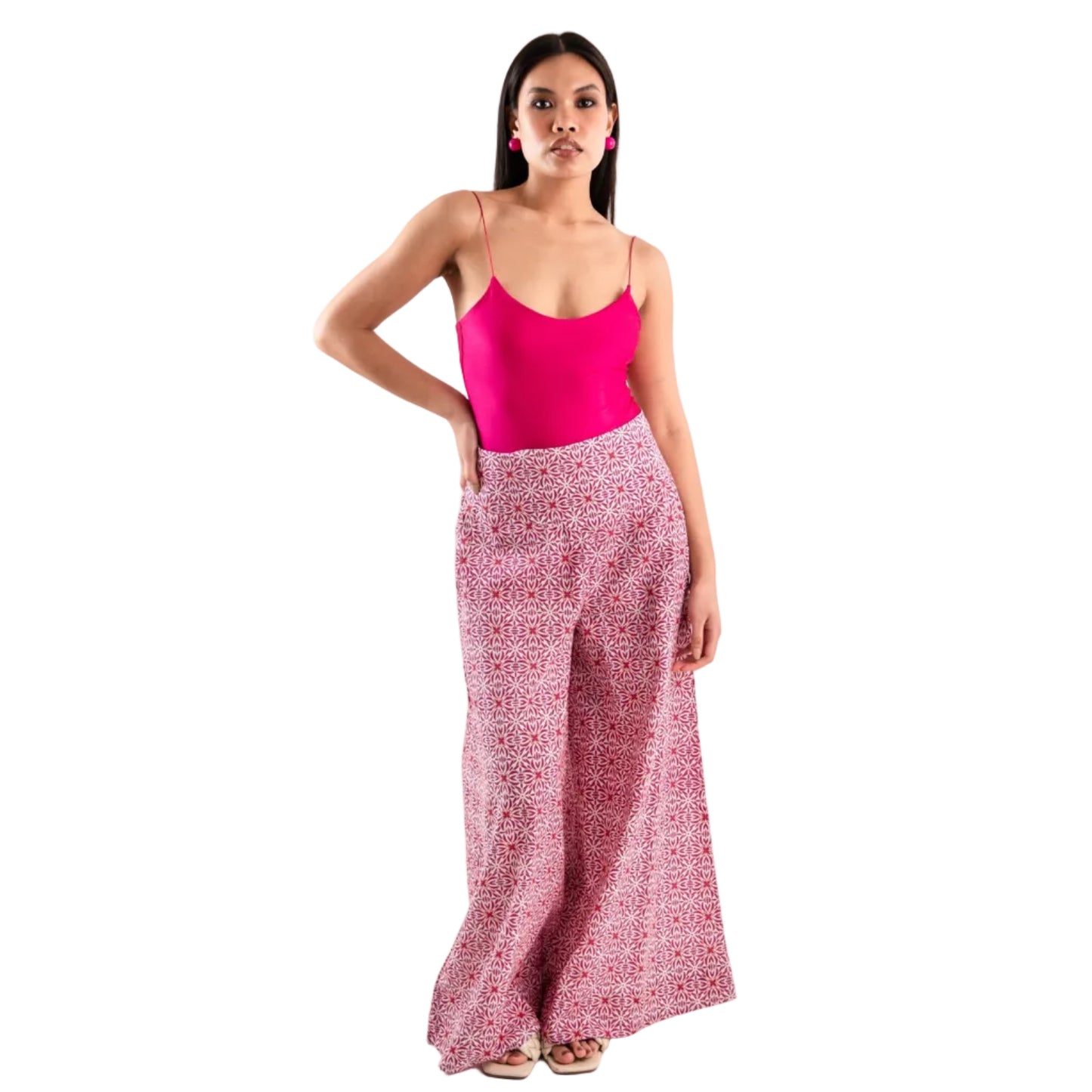 Pantalone in cotone con stampa a fiori bianchi e fucsia
