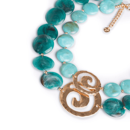 Collana girocollo a due linee con pietre circolari in acrilico tono petrolio, inserti spirale - Mya Accessories