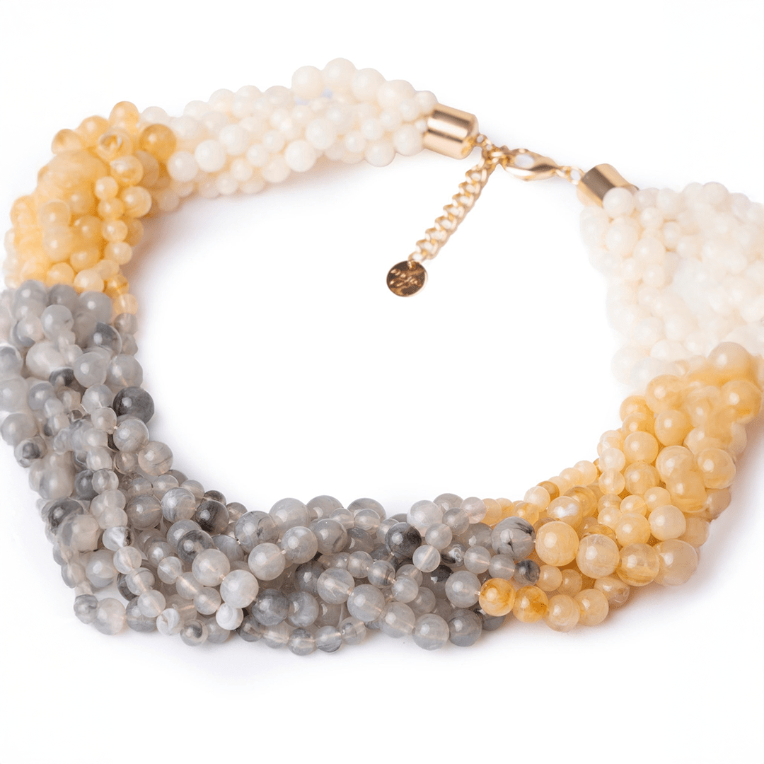 Collana girocollo a treccia con sfere in acrilico sui toni chiari - Mya Accessories
