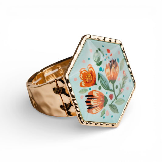 Bracciale rigido elastico con medaglione esagonale e design floreale in resina