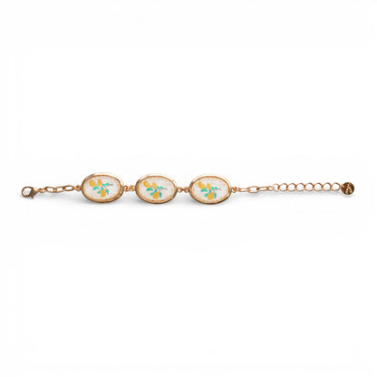 Bracciale a catena con inserti ovali in resina decorati con stampa di limoni
