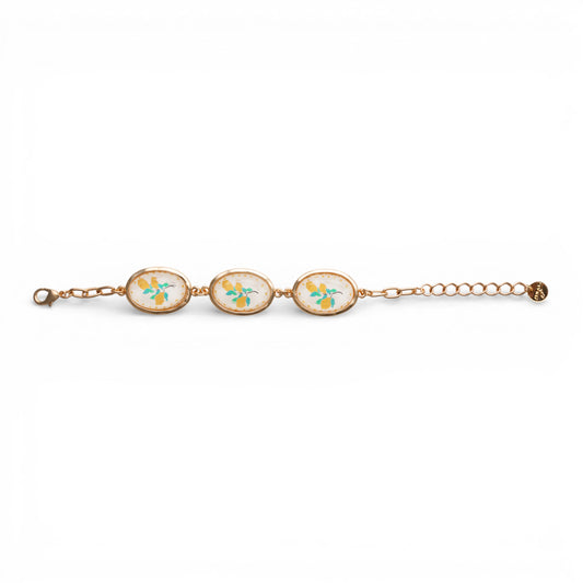 Bracciale a catena con inserti ovali in resina decorati con stampa di limoni