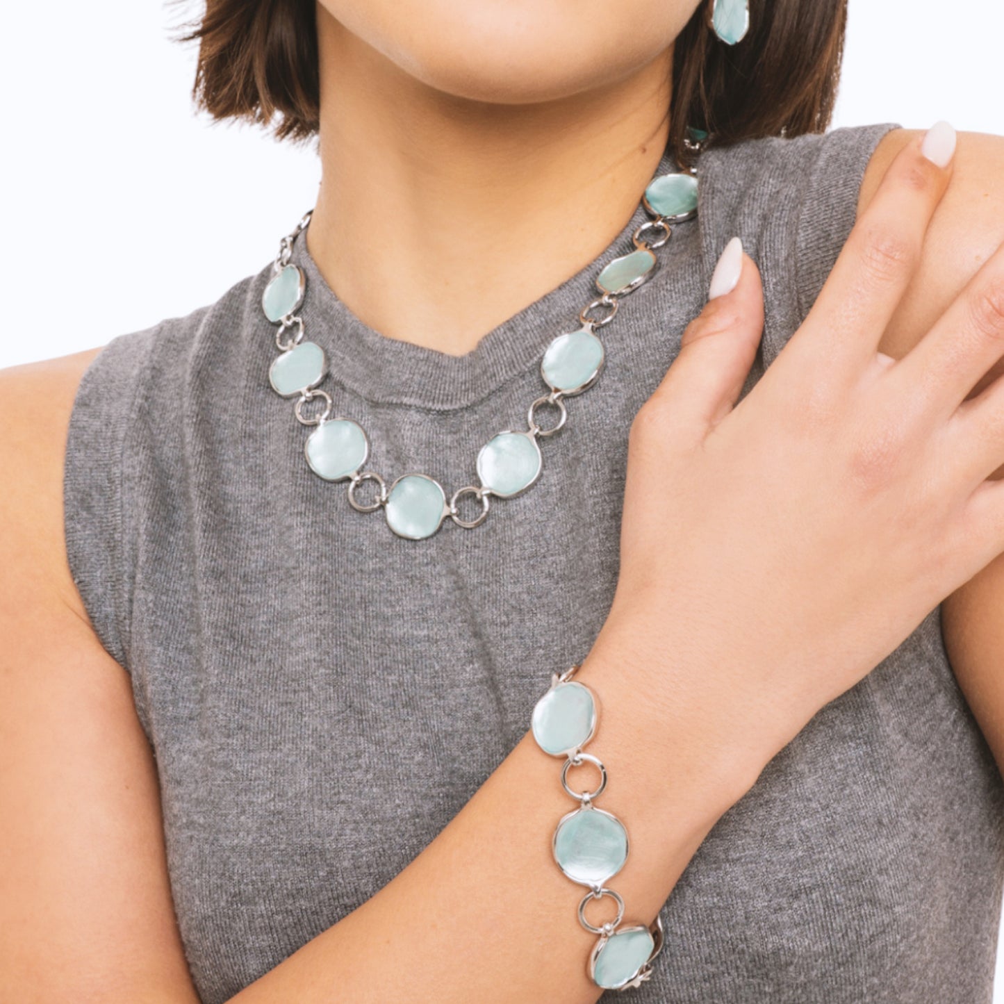 Bracciale a catena con inserti circolari smaltati celeste