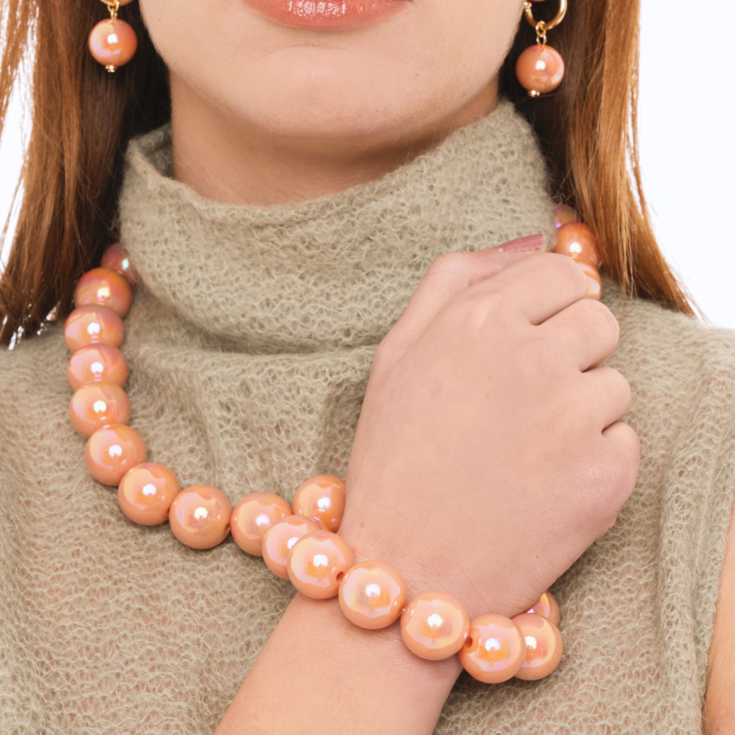 Bracciale elastico con sfere lucide in acrilico rosa