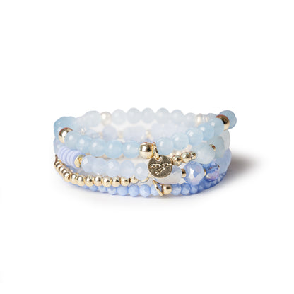Bracciale elastico multi filo con pietre dure tono celeste